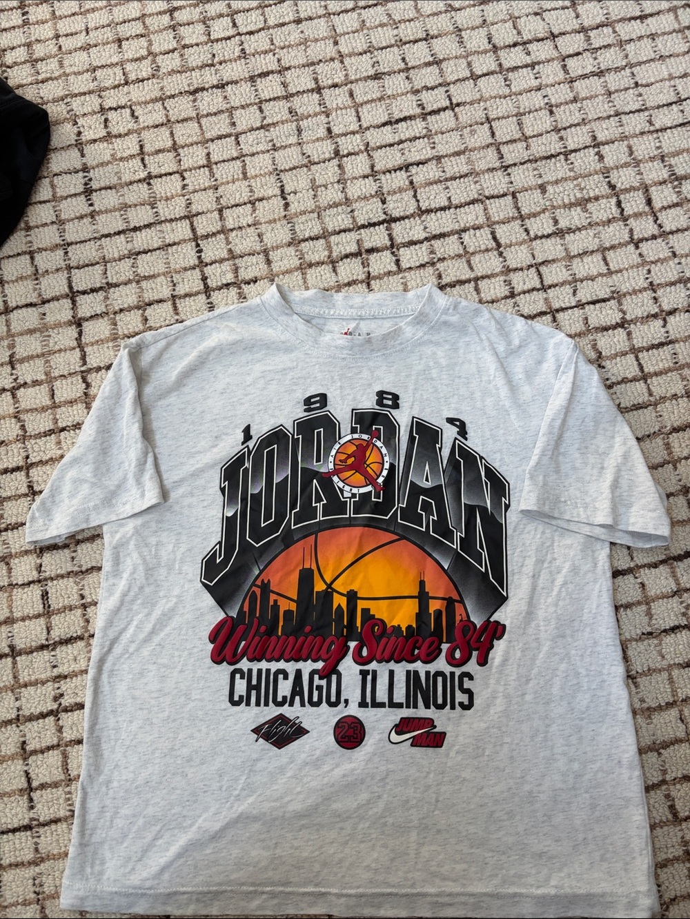 Jordan Gray Short Sleeve Tee with Orange & Black Graphic